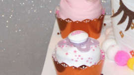 unicorn diaper cake and his cupcakes